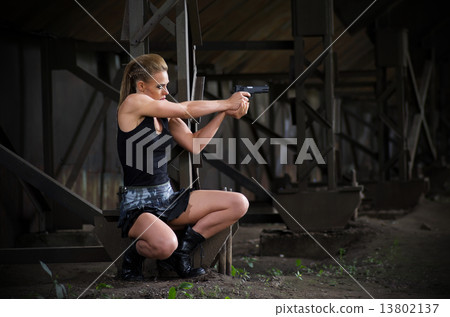 Woman in uniform with gun (normal version) Woman in uniform with gun (normal version) 13802137