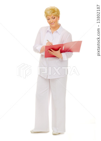 Happy senior woman with notebook 13802187