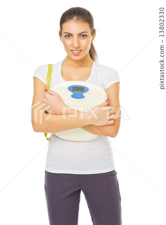 Young healthy girl with scales Young healthy girl with scales 13802330