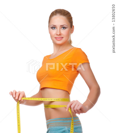 Young smiling woman with centimeter tape Young smiling woman with centimeter tape 13802650