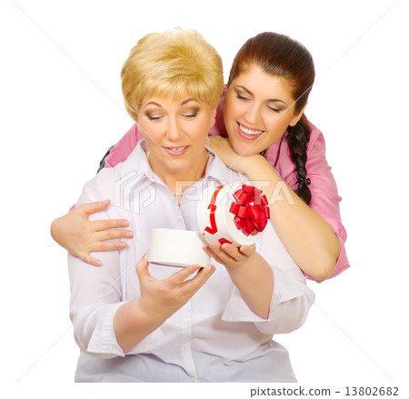 Senior and young women with gift 13802682