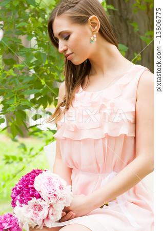 Attractive woman with flowers Attractive woman with flowers 13806775