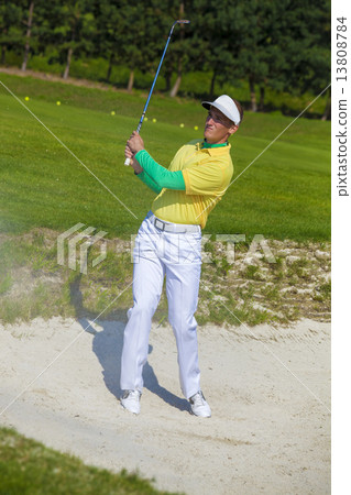 Man playing golf Man playing golf 13808784