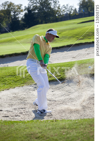 Man playing golf Man playing golf 13808785