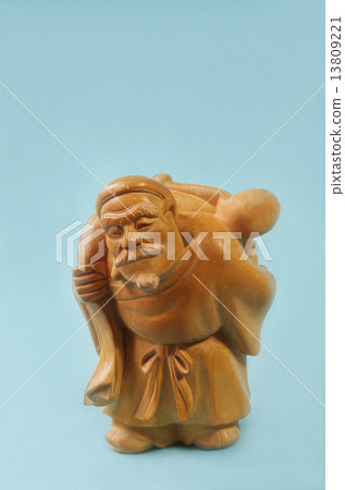 Stock Photo: the god of wealth, daikokuten, woodcarving