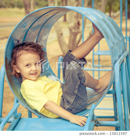 Happy little boy on the playground 13811597