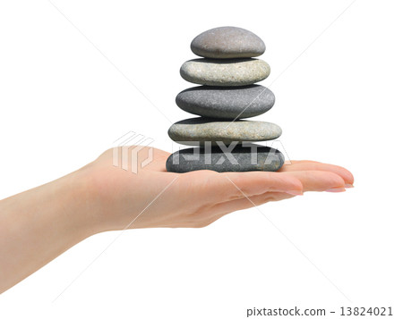 Stack of stones in hand Stack of stones in hand 13824021