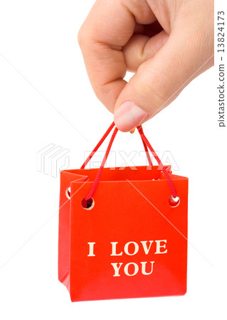 Hand with gift 13824173