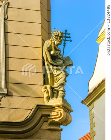 Saint Peter sculpture on a building in Prague Saint Peter sculpture on a building in Prague 13824498