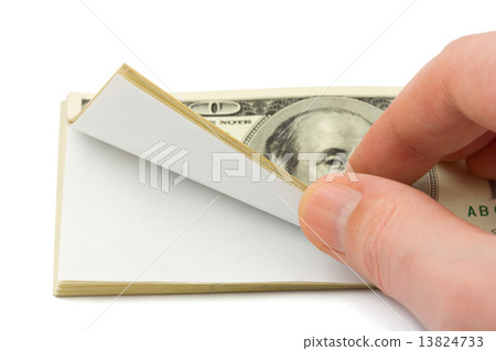 Hand and wad of paper 13824733