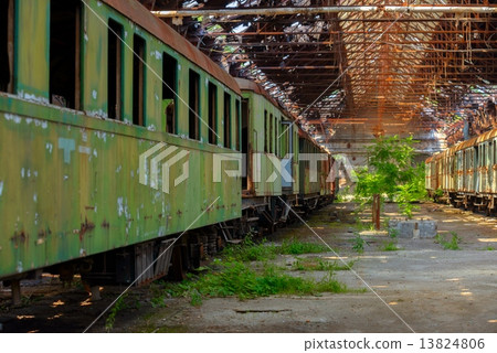 Cargo trains in old train depot Cargo trains in old train depot 13824806