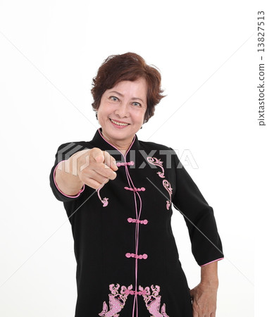 Senior elderly woman pointing happy 13827513