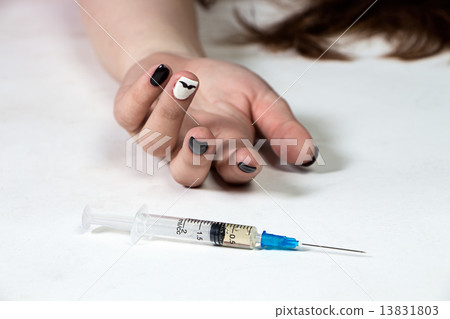 Image of teenager girl and syringe  13831803