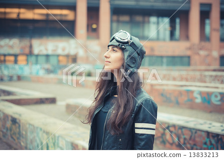 aviator young beautiful brunette woman with cap and glasses 13833213