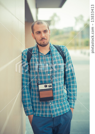 handsome hipster casual multitasking modern man with vintage cam 13833413