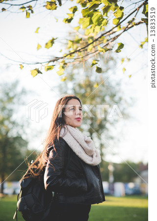 young beautiful long hair woman in town 13833519