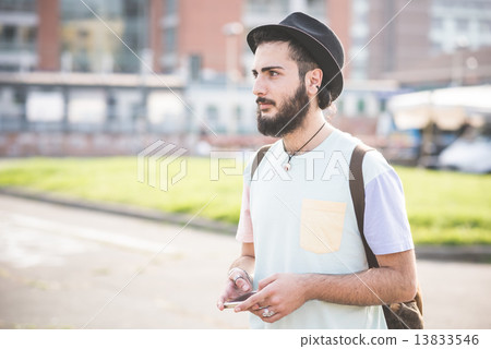 young handsome hipster gay modern man using smartphone 13833546