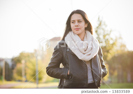 young beautiful long hair woman in town 13833589