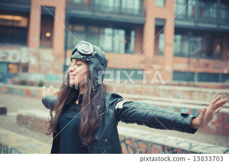 aviator young beautiful brunette woman with cap and glasses aviator young beautiful brunette woman with cap and glasses 13833703