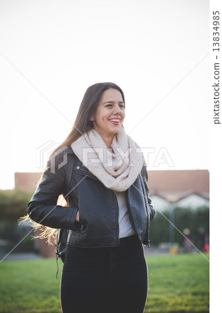 young beautiful long hair woman in town 13834985