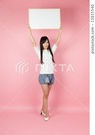 A young woman with Macy's sage board 13835540
