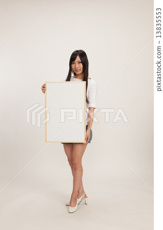 A young woman with Macy's sage board A young woman with Macy's sage board 13835553