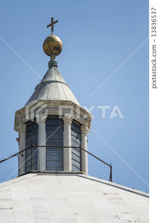 The steeple part of the church that stands in the blue sky The steeple part of the church that stands in the blue sky 13836537