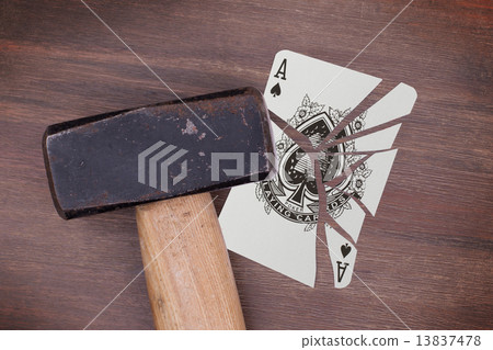 Hammer with a broken card, ace of spades 13837478