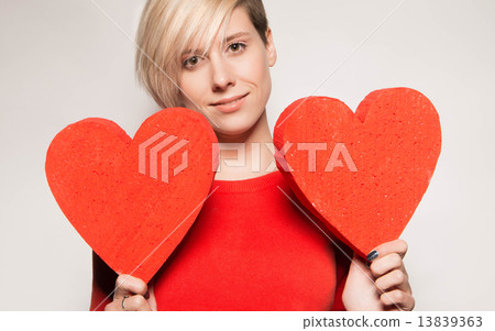Valentine's Day. Love. Girl holding a heart 13839363