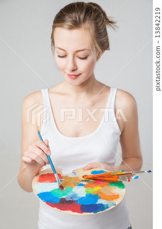 artist woman with paint palette. Isolated. 13842219