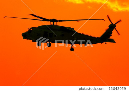 Maritime Self Defense Force's SH-60K Sea Hawk flying against the background of bright sunsets Anti-submarine patrol helicopter 13842959
