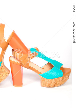 Summer beautiful high heels and beautiful earrings on a white background Summer beautiful high heels and beautiful earrings on a white background 13845509