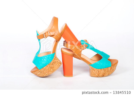 Summer beautiful high heels and beautiful earrings on a white background 13845510