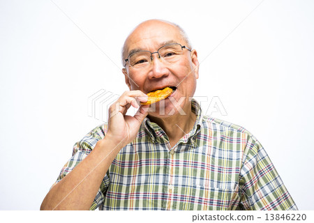 Senior to eat rice cracker Senior to eat rice cracker 13846220