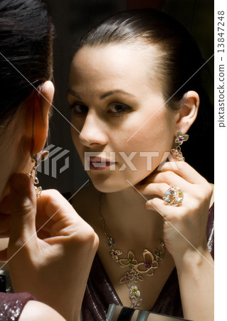 Woman at the mirror 13847248