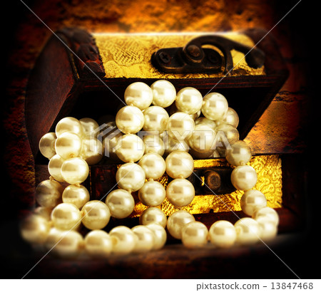 Wooden chest with white pearl necklace Wooden chest with white pearl necklace 13847468