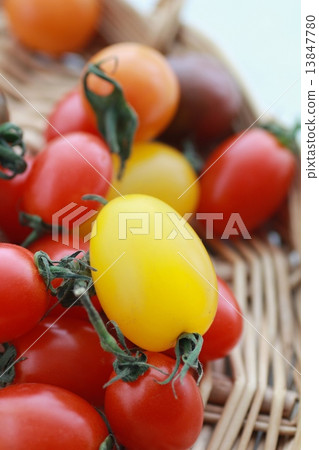 Various kinds of colorful cherry tomatoes on a basket 13847780