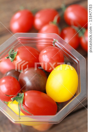 Various kinds of cherry tomatoes in plastic cups Various kinds of cherry tomatoes in plastic cups 13847783