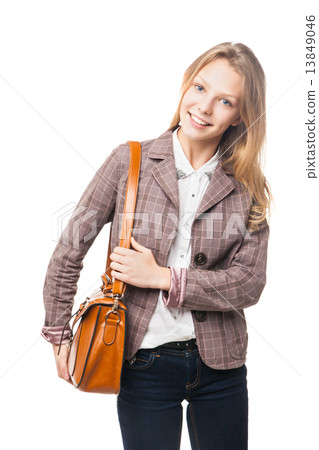 Smiling young beautiful girl standing with bag Smiling young beautiful girl standing with bag 13849046