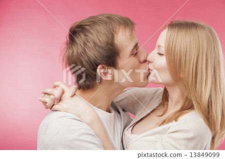 young boy kissing cute girlfriend 13849099