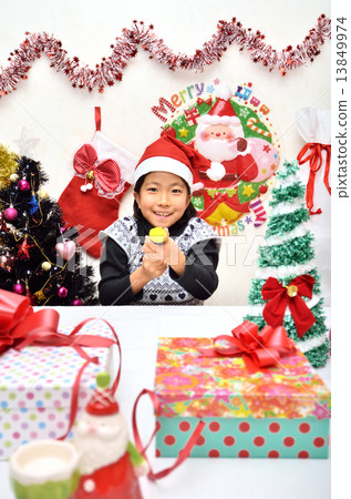 Santa Claus costume girls ringing crackers Santa Claus costume girls ringing crackers 13849974