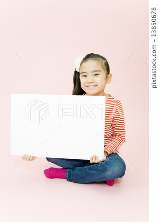 A girl with a message board 13850678