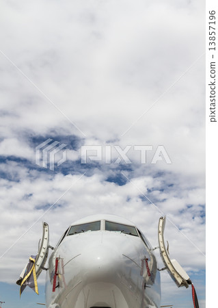 Plane Under the Clouds Plane Under the Clouds 13857196