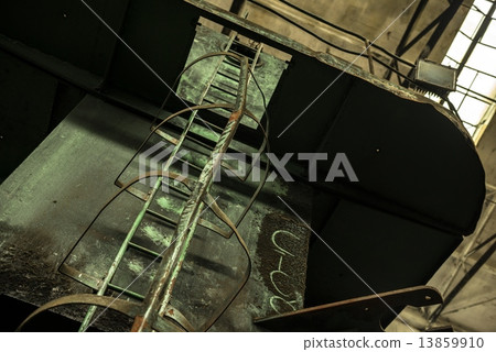 Ladder in industrial interior 13859910