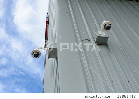 Security camera install corner of building 13861418