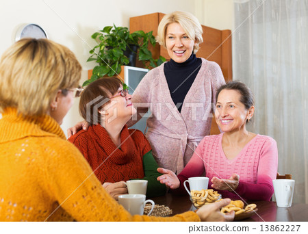 Female having cup of tea 13862227