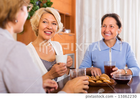 Mature women having coffee break 13862230