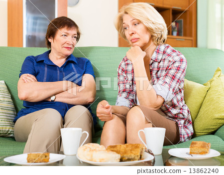 sad mature women discussing problems sad mature women discussing problems 13862240