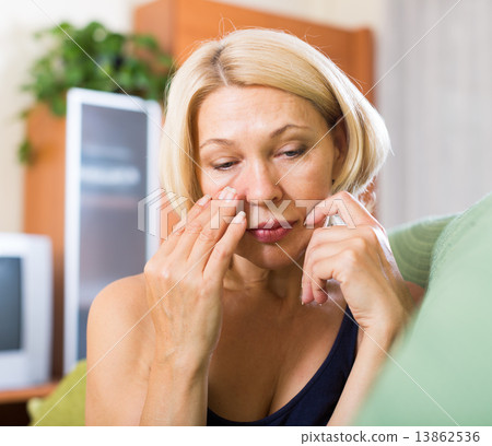 Depressed elderly woman Depressed elderly woman 13862536