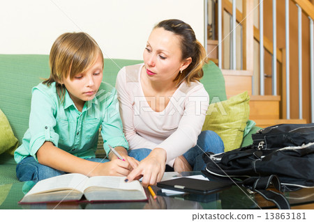 Mom and schoolboy son Mom and schoolboy son 13863181